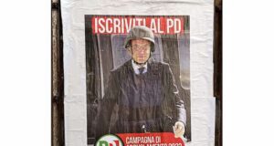 Roma, manifesti con Letta con elmetto per campagna Pd di arruolamento